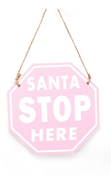 Pink Santa stop here sign
